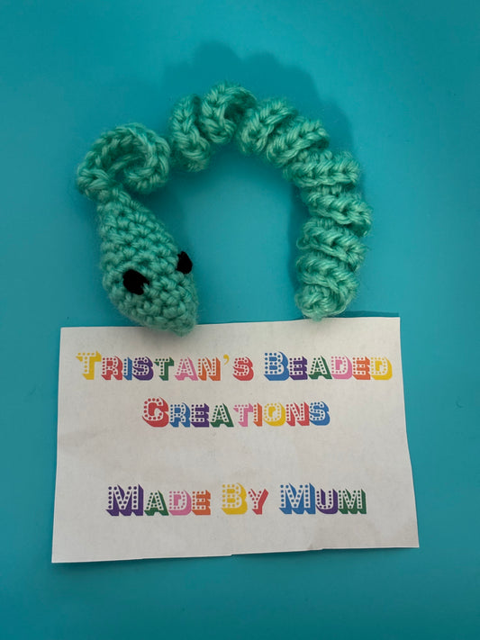 Small Crocheted Snakes Made by Mum